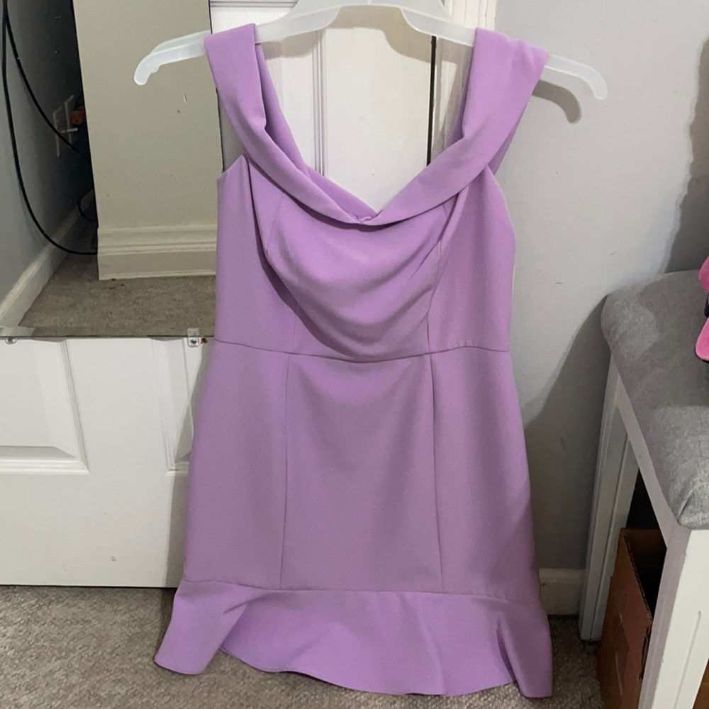 NEW WITH TAGS!! Super cute dress!! Off the shoulders with a ruffle bottom!!